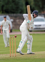 Bollington batsman watches the ball pass his stumps