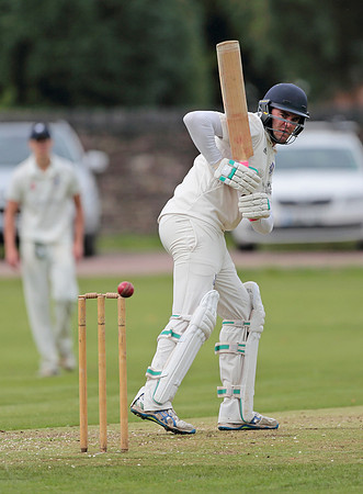 Bollington batsman watches the ball pass his stumps